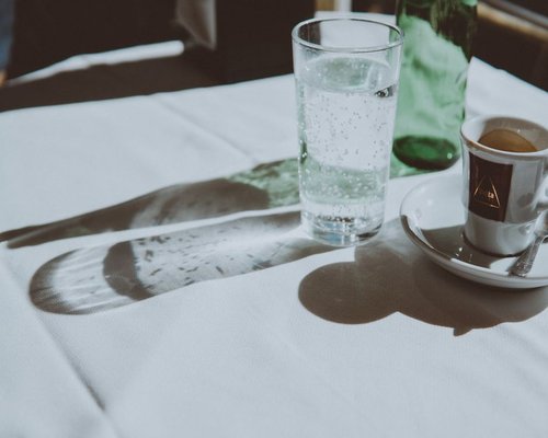 water and coffee on a morning table